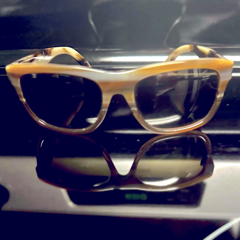 Ferragamo sunglasses gently used. Fashionable brown/cream/tan unisex sunglasses.